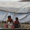  Attack-on-Yemeni-city-could-overwhelm-humanitarian-capacity-warns-UN-migration-agency - Yemen: As food crisis worsens, UN agencies call for urgent assistance to avert catastrophe [Around 200 displaced families live in an informal settlement in Dharwan, Yemen. Here, a 12-year old girl keeps watch over her younger brothers. Photo: UNHCR/Mohamm